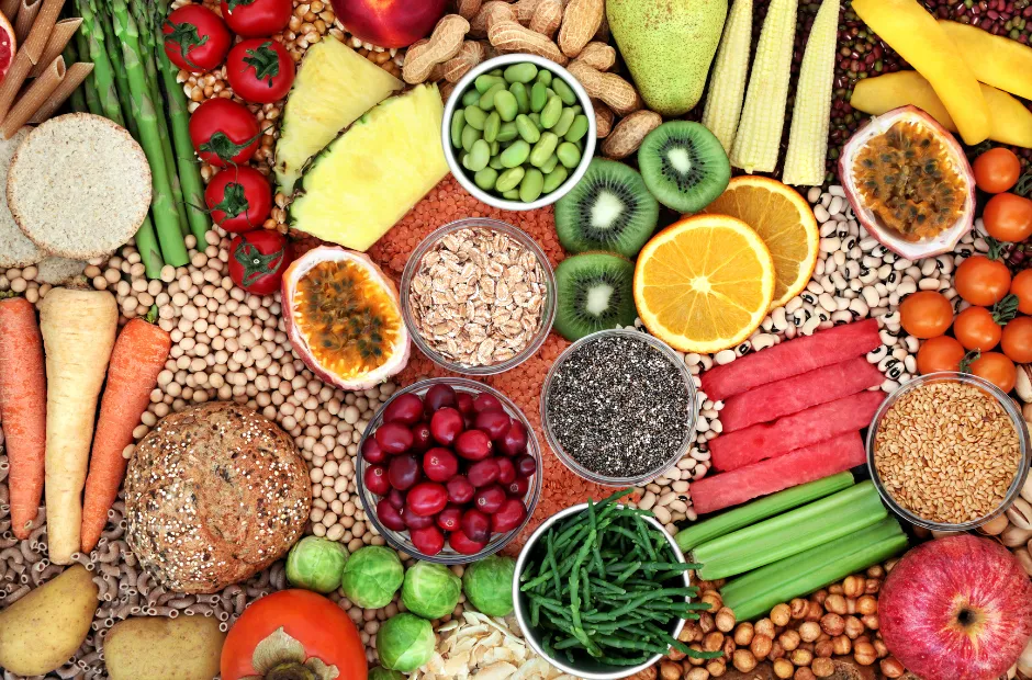 Diverse array of colorful whole foods representing variety in nutritional choices